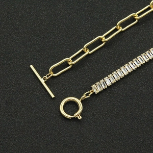 Golden paperclip chain and tennis chain necklace with baguette cubic zirconia stones