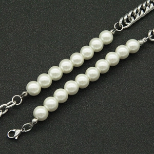 Hip-hop style necklace featuring silver Cuban link chain and white pearl splice design