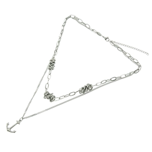 Double-layered silver titanium steel necklace featuring a nautical anchor pendant and chain