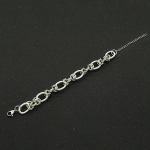 Detail of silver link bracelet with large oval rings, lobster clasp and extension chain