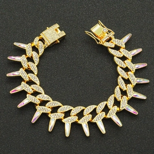 Hip hop gold Cuban link bracelet with iced out crystals and iridescent spiked accents
