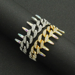 Hip hop iced out Cuban chain with spiked charms in gold and silver finish