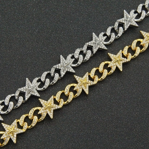 Hip hop style gold and silver star studded Cuban link chains with shimmering iced out crystals