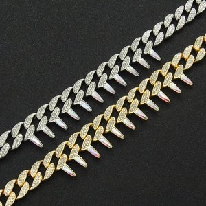 Hip hop iced out Cuban link bracelet with iridescent spikes in gold and silver finish