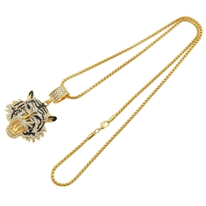 Collier avec pendentif tête de tigre doré orné de strass et détails en émail noir