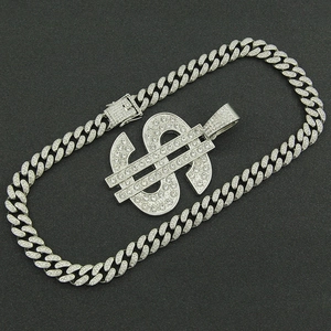 Close-up of hip-hop silver dollar sign pendant with iced out cuban link chain