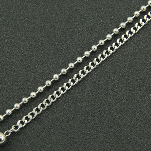 Polished titanium steel ball and curb chain necklace set for a minimalist aesthetic