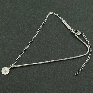 Minimalist spliced metal choker with snake chain and engraved round pendant for women