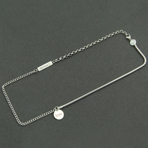 Hip-hop style silver titanium steel necklace featuring spliced chains and a letter pendant