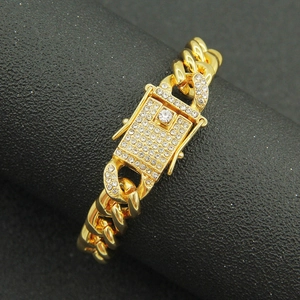 Gold-plated hip hop Cuban link necklace featuring a sparkling iced-out rhinestone clasp