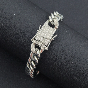 Hip hop silver Cuban link bracelet featuring a iced-out rhinestone buckle for men's street style