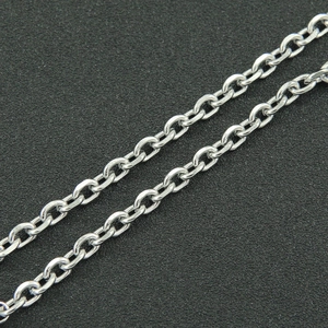 Macro detail of polished stainless steel O-chain links with shiny metallic finish
