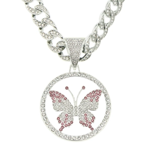 Detail of silver cuban chain with iced out butterfly pendant and pink rhinestones