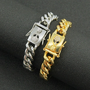 Bracelet gourmette hip hop or et argent avec boucle tête d'alien sertie de diamants