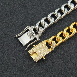 Men's hip hop Cuban link bracelet in gold and silver with iced out rhinestone clasp