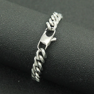 Polished titanium steel Cuban link bracelet with lobster clasp for a minimalist unisex look