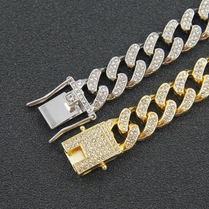 Iced out hip hop Cuban link chain bracelet in gold and silver finish with full rhinestones