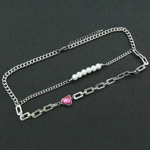 Double-layered silver Cuban chain necklace with white pearls and pink heart gemstone pendant