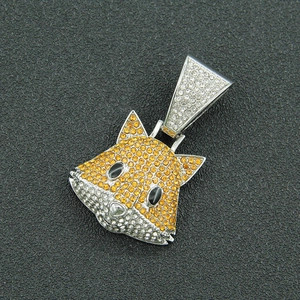 Macro view of crystal encrusted fox pendant with yellow and white micro-paved rhinestones