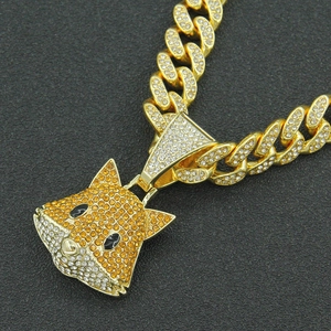 Hip hop cuban link chain featuring a 3D fox pendant encrusted with orange and white crystals