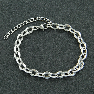 Minimalist silver oval link chain bracelet with adjustable lobster clasp on black background