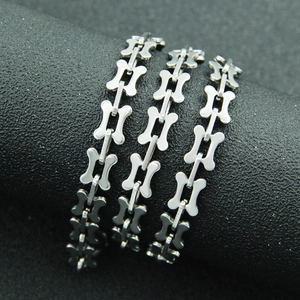 Polished silver stainless steel bone-link chain bracelet with a unique edgy design