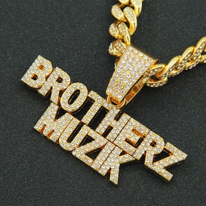 Hip-hop Cubaanse schakelketting met gouden BROTHER MUZIKZ letterhanger en zirkonia
