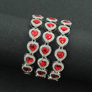 Hip hop style silver Cuban chain necklace featuring red rhinestone heart pendants