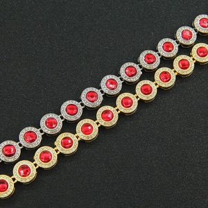 Hip hop tennis bracelets in gold and silver with round red crystals and white pavé diamonds