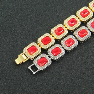 Hip-hop tennis bracelet with red rectangular stones and iced out crystals in gold and silver