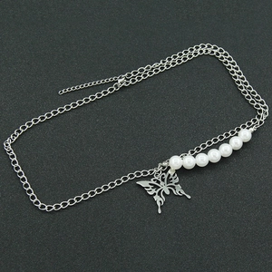 Retro silver necklace featuring a hollow butterfly pendant and white pearls on O-chain