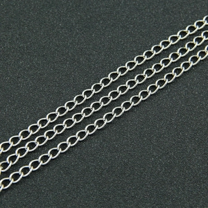 Detailed view of silver butterfly pendant pearl necklace with multi-layer metal chains