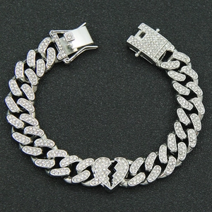 Men's hip-hop silver iced-out Cuban link bracelet with broken heart centerpiece design