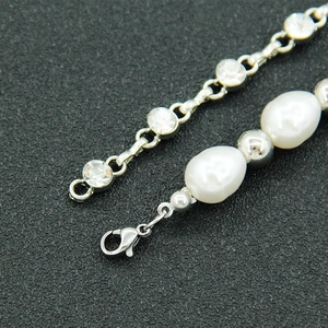 Baroque pearl bracelet with crystal studded buckle and metallic silver beads for women