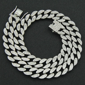 Close-up of hip-hop silver Cuban link chain featuring icy micro-pave rhinestones and clasp