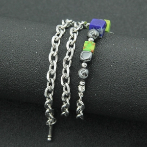 Retro multi-layer necklace with blue and green cat eye stones and dark grey beads
