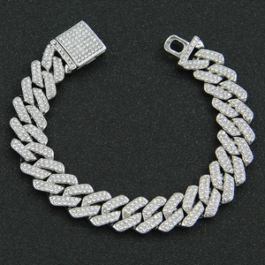 Detail of silver iced-out Cuban link bracelet with box clasp for hip hop men fashion