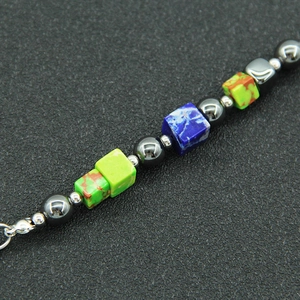 Bracciale in acciaio al titanio con ematite, perle occhio di gatto e pietre colorate