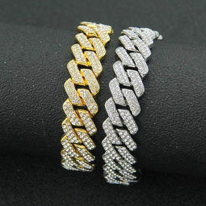 Iced out hip hop Cuban link chain in gold and silver finish with full rhinestone inlay
