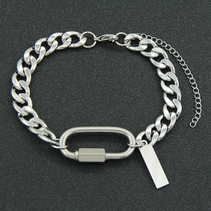 Silver stainless steel Cuban link bracelet with oval carabiner and blank tag on black