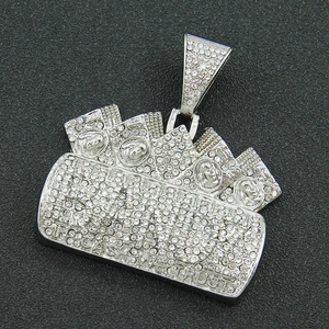 Macro view of silver iced-out money pendant with In Cash We Trust engraving