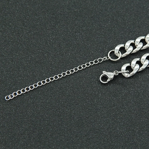 Silver stainless steel Cuban chain bracelet with adjustable lobster clasp and link detail