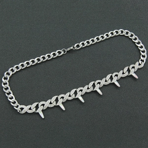 Punk style silver necklace with rhinestone paved figure-eight links and pearl spikes
