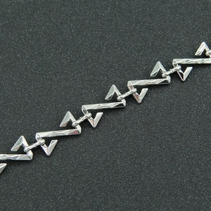 Bracelet unisexe en acier inoxydable argenté avec maillons en Z et motif losange gaufré