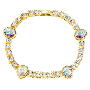 Hip hop style gold skull tennis bracelet with sparkling diamonds and purple aurora stones