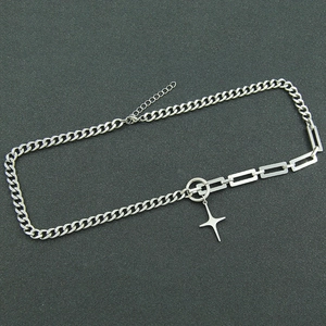 Silver Cuban chain necklace with rectangular links and star pendant on dark grey background