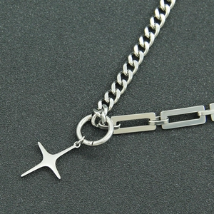 Silver Cuban link necklace with star pendant and rectangular geometric chain mix