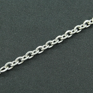 Macro detail of polished stainless steel cable chain links with high brightness finish