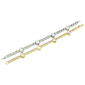 Hip hop skull tennis bracelet with sparkling crystals in gold and silver plating