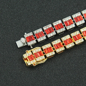 Hip hop Cuban link bracelet featuring red square stones and paved white diamonds